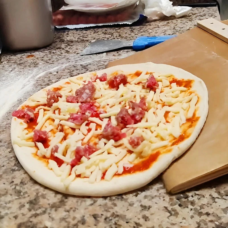 Pizzaspade med glidfunktion – tunn & värmetålig design - ELLY